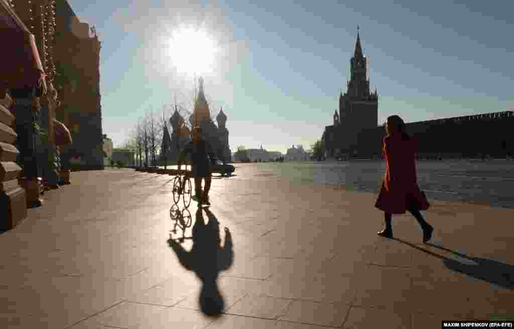 People walk on Red Square amid a coronavirus shutdown in Moscow, Russia.&nbsp;