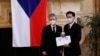 Taiwanese Foreign Minister Joseph Wu (right) is presented with a commemorative medal by Czech Senate speaker Milos Vystrcil during his visit to Prague on October 27. 