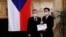 Taiwanese Foreign Minister Joseph Wu (right) is presented with a commemorative medal by Czech Senate speaker Milos Vystrcil during his visit to Prague on October 27. 