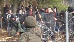 Heightened Tensions On Poland-Belarus Border As Migrants Attempt To Force Down Border Fence