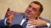 The Serb representative to Bosnia's tripartite presidency, Milorad Dodik, has said the Srebrenica genocide "did not take place" and has refused to work with "Bosnian institutions" since a ban on genocide denial was instituted. (file photo)