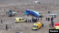 A drone view shows the crash site near the city of Aqtau in Kazakhstan. 