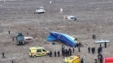 A drone view shows the crash site of a passenger plane near Aktau