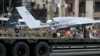 A Turkish Bayraktar drone like this one at Kyiv's Independence Day military parade in August was used to destroy a Russian-made howitzer in a separatist-controlled area.