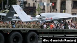 A Turkish Bayraktar drone like this one at Kyiv's Independence Day military parade in August was used to destroy a Russian-made howitzer in a separatist-controlled area.