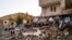 Buildings lie damaged in a village in Iran's East Azerbaijan Province following an earthquake on November 8. 