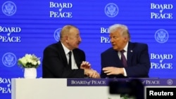 İlham Əliyev və Donald Tramp Davosda Sülh Şurası nizamnaməsinin imzalanması mərasimində