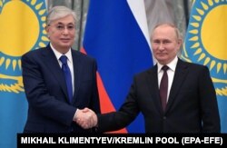 Kazakh President Qasym-Zhomart Toqaev (left) and Russian President Vladimir Putin are seen following talks in the Kremlin on February 10.