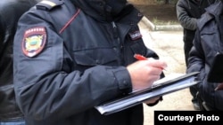 Rus polisiýa işgäri (arhiwden alnan illýustrasiýa suraty)