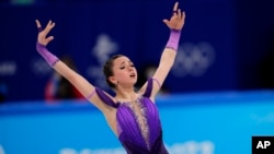 Kamila Valiyeva competes in the women's short program team figure-skating competition at the 2022 Winter Olympics in February 2022 in Beijing.