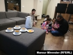 Jawed Ahmad Haqmal and his family in his Kyiv hotel room.