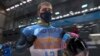 Vladyslav Heraskevych flashed the small sign in the blue and yellow colors of the Ukrainian flag on February 11.