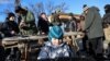 UKRAINE -- Residents take part in a military exercise for civilians conducted by a far-right radical group, Right Sector, amid threat of Russian invasion in Kyiv, Ukraine, February 13, 2022. REUTERS/Umit Bektas