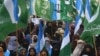 Supporters of the Islamic political party Jamaat-e-Islami (JI) shout anti-India slogans at a protest in Karachi on February 10.