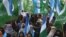 Supporters of the Islamic political party Jamaat-e-Islami (JI) shout anti-India slogans at a protest in Karachi on February 10.