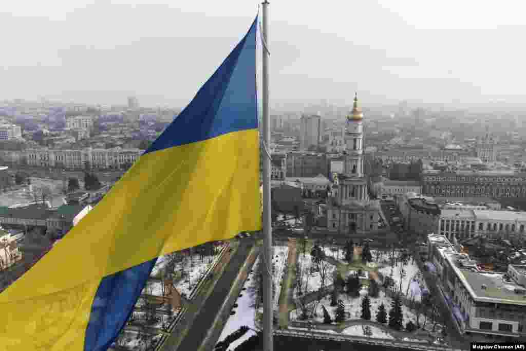 A Ukrainian national flag waves over the center of Kharkiv.