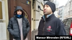 Afghan émigré Jawed Ahmad Haqmal (right) in central Kyiv with his brother.