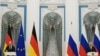Канцлерът на Германия Олаф Шолц и президентът на Русия Владимир Путин