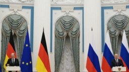 Канцлерът на Германия Олаф Шолц и президентът на Русия Владимир Путин