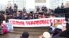 Opposition groups hold a rally in Almaty on February 13, 2022, to honor the victims of the January 2022 crackdown on anti-government protests in the country and demand accountability for the violations of human rights.