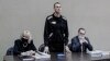 Кадър от монитор в помещението, пригодено за съдебна зала. Алексей Навални по време на изнесеното съдебно заседание в наказателната колония в Покров, 15 февруари.
