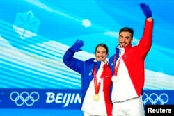 С олипийските медали от Пекин