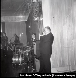 Tito photographs the dance floor at a party in the 1970s.