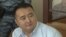 Serikzhan Bilash appears in court in Almaty on July 29.