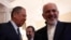 Russian Foreign Minister Sergei Lavrov (left) welcomes his Iranian counterpart, Mohammad Javad Zarif, during their meeting in Moscow on May 14. 
