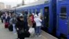 People board an evacuation train in the port city of Odesa this week. 