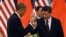 U.S. President Barack Obama (left) and Chinese President Xi Jinping drink a toast at a lunch banquet in the Great Hall of the People in Beijing on November 12.