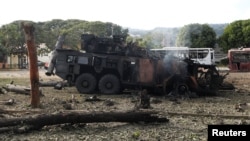 Зьнішчаная зэнітная ўстаноўка на вэнэсуэльскай авіябазе Ла-Карлота ў Каракасе пасьля амэрыканскага ўдару. 3 студзеня 2026 году