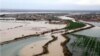 An aerial view of large swaths of land flooded in Iran's oil-producing Khuzestan province. April 5-6, 2019