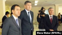 Deputy Education Minister Sayat Shayakhmetov (center) in a public appearance from late April