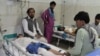 A wounded men receives treatment in a hospital after a suicide attack on the outskirts of Jalalabad city east of Kabul, on June 13.