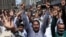 Pakistani Shi'ite Muslims in Karachi raise their hands and chant slogans as they attend an anti-Israel protest on June 13 following its strikes on Iran. 