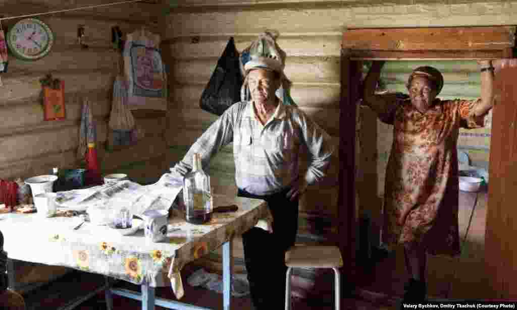 A family shows off the cozy comforts of home in one of the traditional local houses.