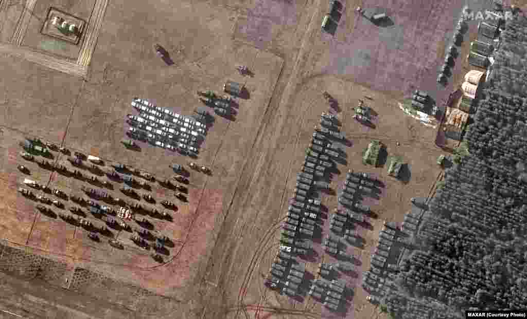 Vehicles assembled at the airfield near Mazyr on February 22.