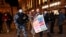 Задержание участницы акции протеста в Москве