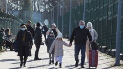 Civili prelaze iz Ukrajine u Poljsku pred ruskom invazijom, 24. februar 2022.