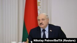 Belarus - Alexander Lukashenko chairs a meeting with military officials in Minsk, Belarus February 24, 2022