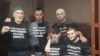 Five defendants from the widely criticized"25 Case" in court in Simferopol last year: Shaban Umerov (left), Raim Aivazov (second left), Riza Izetov (center), Farhod Bazarov (second from right), and Remzi Bekirov. 