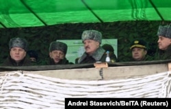 Belarusian President Alyaksandr Lukashenko (center) attends the joint military exercises with Russian forces in Belarus on February 17.