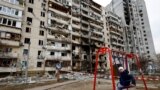 UKRAINE-CRISIS/ Damaged Residential Building Kyiv Child Swing