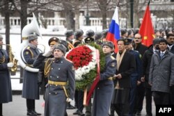 Pakistani Prime Minister Imran Khan takes part in a wreath-laying ceremony at the Tomb of the Unknown Soldier by the Kremlin Wall in Moscow on February 24.