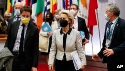 European Commission President Ursula von der Leyen (center) finishes an EU summit in Brussels about the European Union’s response to Russia’s invasion of Ukraine on February 25.