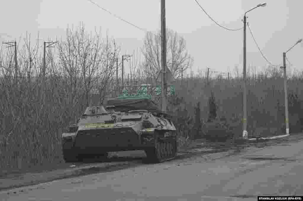 Ukrainian forces were also damaged in battles on the outskirts of Kharkiv. This epa photo describes a &quot;destroyed Ukrainian armored vehicle&quot; on February 24.&nbsp;