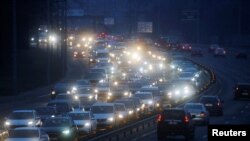 UKRAINE - Cars drive towards the exit of Kyiv after Russian President Vladimir Putin authorized a military operation in eastern Ukraine, February 24, 2022.