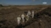 Первый кадр российского пропагандистского фильма о массовых захоронениях на Луганщине