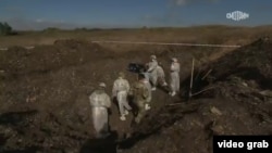 Первый кадр российского пропагандистского фильма о массовых захоронениях на Луганщине